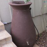 our rain barrel set up to water our back slope